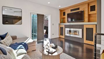 Smart TV, fireplace, DVD player, books