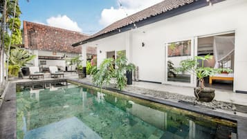 Outdoor pool, pool umbrellas, pool loungers