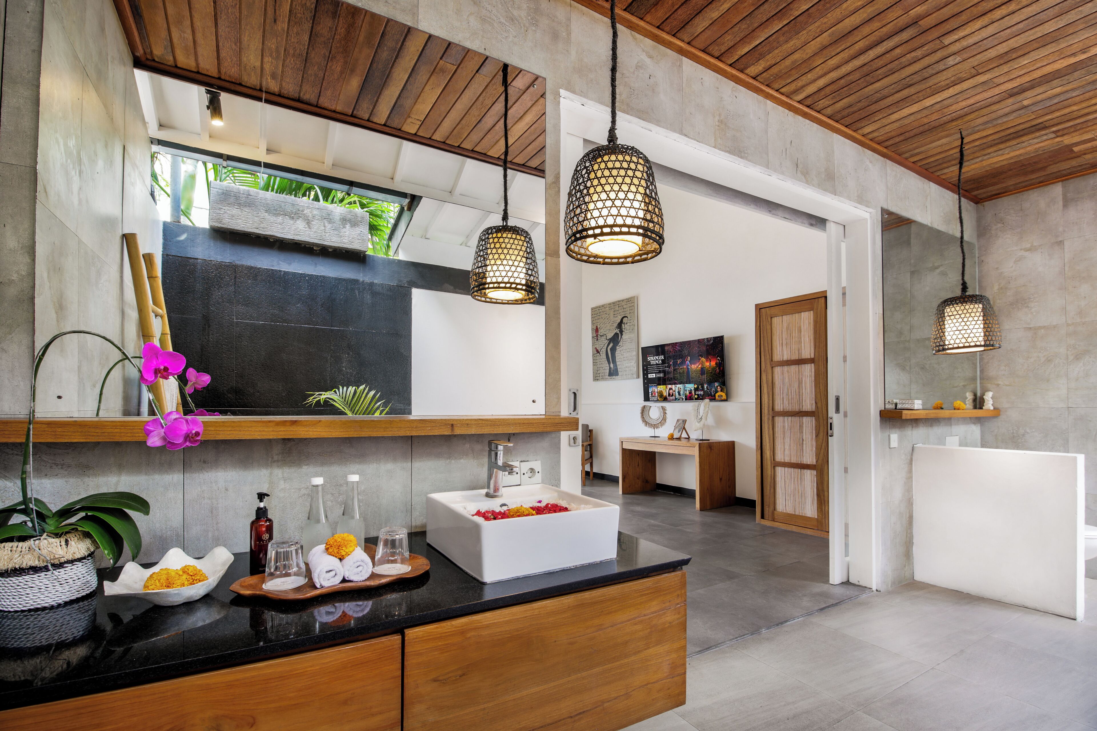 Separate bathtub and shower, towels, soap, shampoo