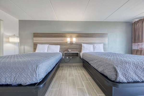 Unit with 2 Queen beds. Exact unit will be assigned upon arrival. Views, colors, and decor may vary.