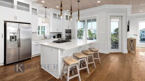 Fridge, microwave, oven, stovetop - Sea You Later by Kaiser Vacation Rentals Cottages at Romar 15 (Orange Beach)