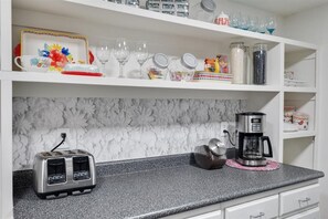 Coffee bar with a coffee maker and toaster