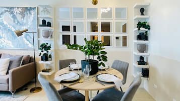 Signature Condo, 1 Bedroom, Balcony | In-room dining