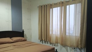 Room - Charming 1-bedroom condo in front of SM South Mall.  (Las Piñas)