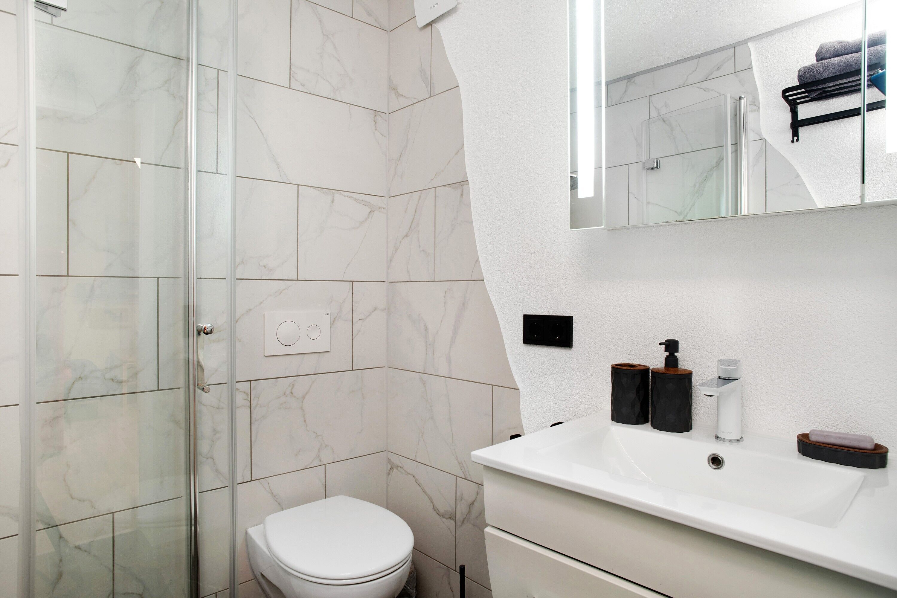 Shower, free toiletries, hair dryer, towels