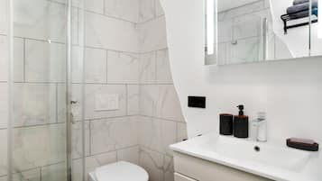 Shower, free toiletries, hair dryer, towels