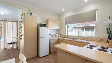 House, Multiple Beds, Non Smoking, Garden View | Living area | 55-inch flat-screen TV with digital channels, LED TV