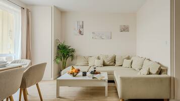 Comfort Apartment, Lanai, Courtyard View | Living area | 40-inch LCD TV with cable channels