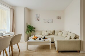 Comfort Apartment, Lanai, Courtyard View | Living area | 40-inch LCD TV with cable channels - Lumina apartments with 2 terrace (Warsaw)