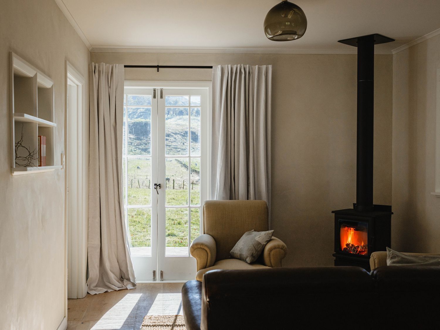 Cosy living area with wood-burner.
