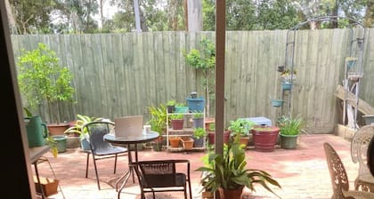 quiet location on a creek back door. amongst the cockatoos, n parrots.