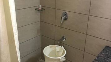 Shower, rainfall showerhead, towels, soap
