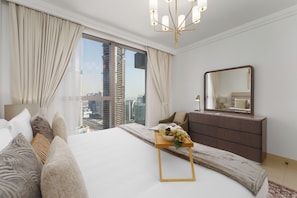 Deluxe Apartment, 1 Bedroom, Balcony, Canal View | 1 bedroom, in-room safe, blackout drapes, iron/ironing board