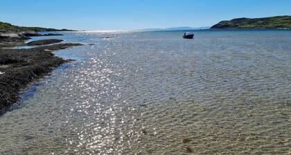 Beautiful secluded cosy cottage on private coastal estate. Dog friendly.