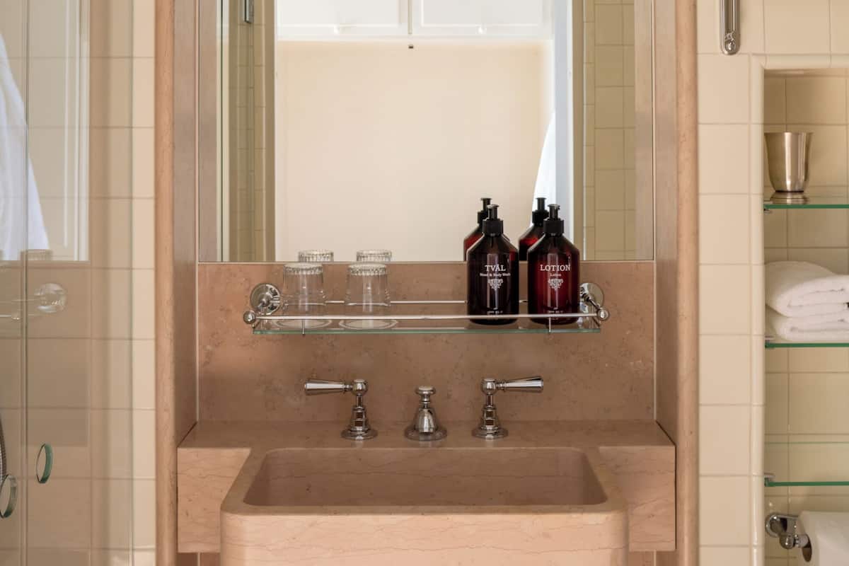 Hair dryer, bathrobes, towels, soap