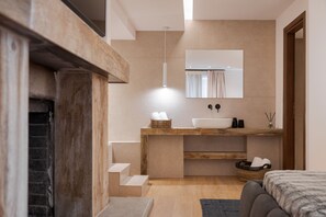 A modern bathroom with a wooden vanity, a large mirror, and a built-in sink. - Mons Arachova (Distomo-Arachova-Antikyra)