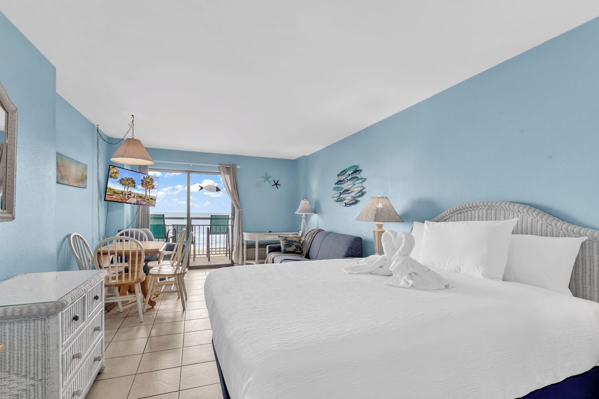 Signature Condo, 1 Bedroom, Balcony, Ocean View | Living room | 50-inch Smart TV with digital channels