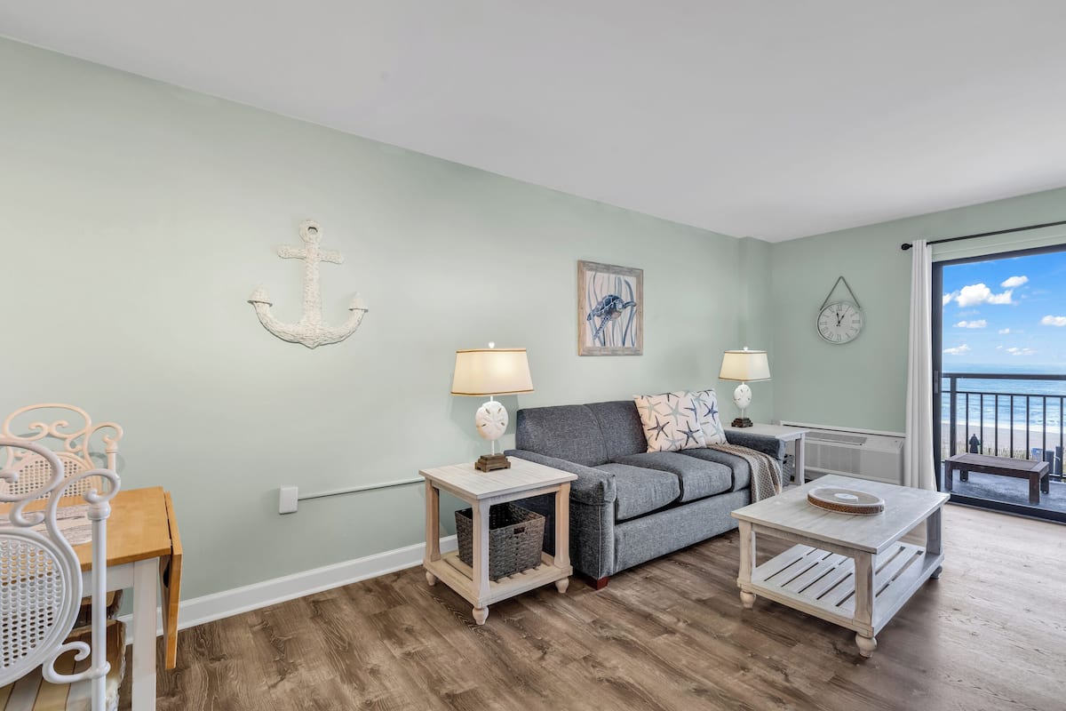 Standard Condo, 1 Bedroom, Pool Access, Beachside | Living room | 50-inch Smart TV with digital channels