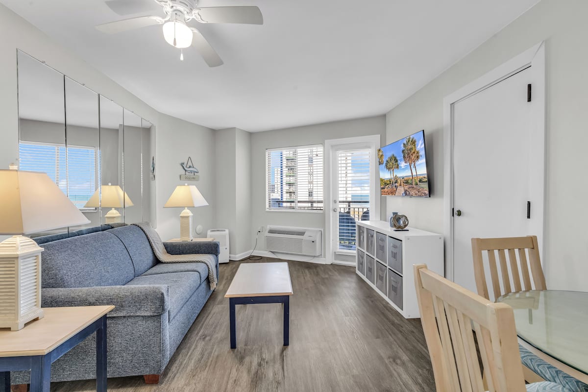 Standard Condo, 1 Bedroom, Balcony, Partial Ocean View | Living room | 50-inch Smart TV with digital channels