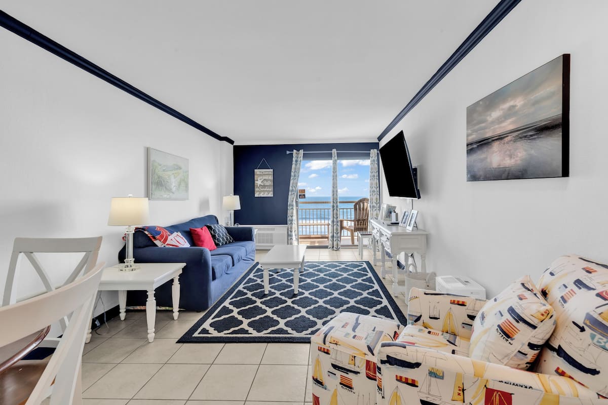 Signature Apartment, 1 Bedroom, Balcony, Ocean View | Living room | 50-inch Smart TV with digital channels