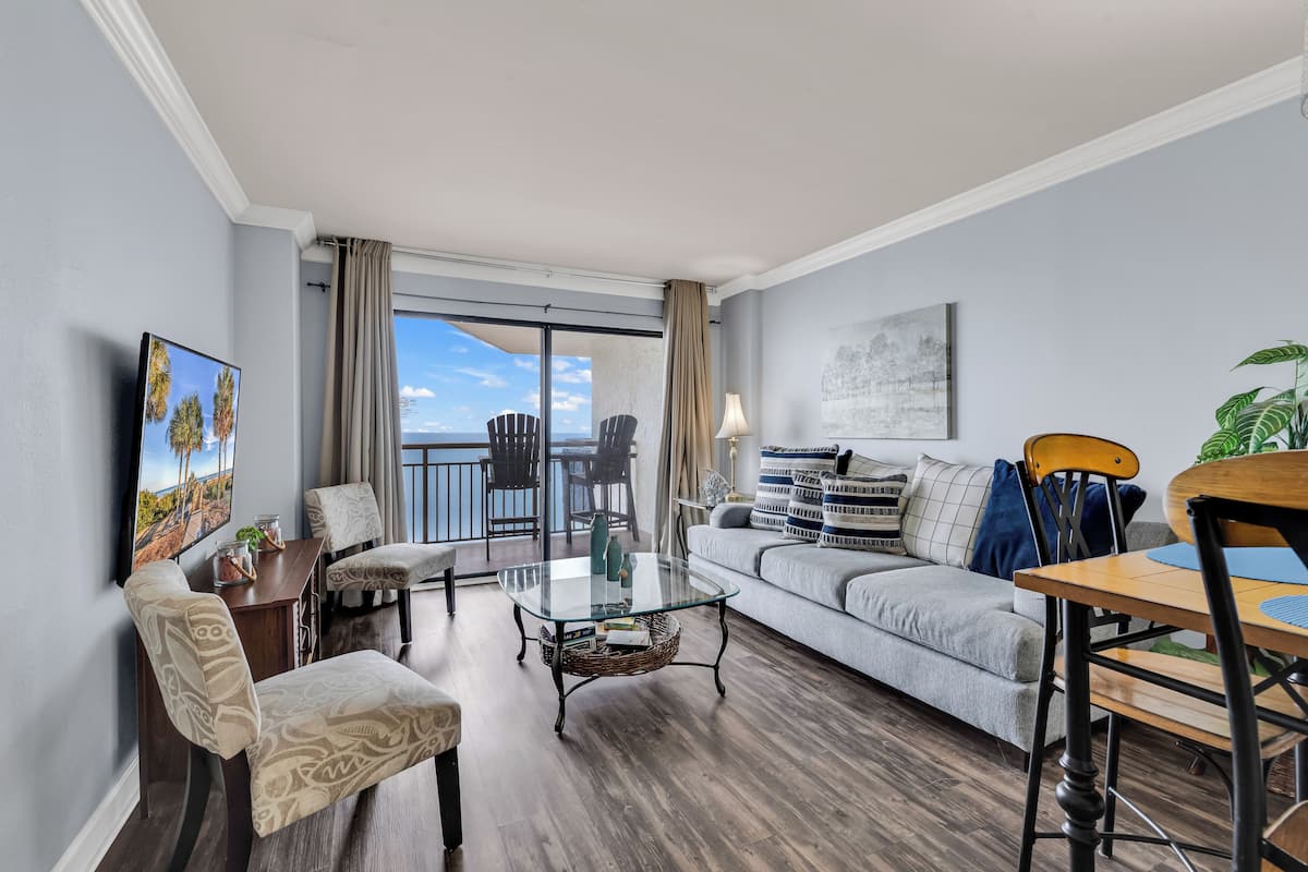 Family Condo, 2 Bedrooms, Pool Access, Beach View | Living room | 50-inch Smart TV with digital channels