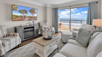 Signature Condo, 2 Bedrooms, Beach View, Beachside | Living room | 50-inch Smart TV with digital channels
