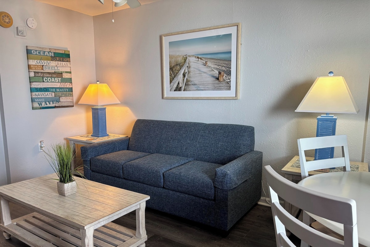 Standard Condo, 1 Bedroom, Non Smoking, Balcony | Living room | 50-inch Smart TV with digital channels