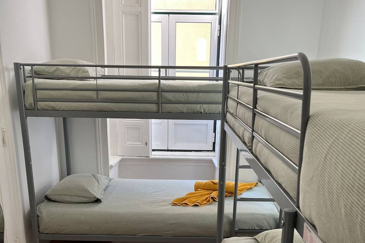 Basic Quadruple Room, City View | Free WiFi, bed sheets