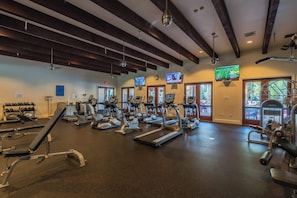 A gym with treadmills, stationary bikes, and weight machines. - Overlook Oasis B | Studio Legacy Villa (La Quinta)