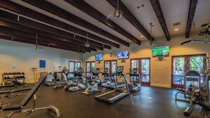 A gym with treadmills, stationary bikes, and weight machines. - Overlook Oasis C | Studio Legacy Villa (La Quinta)