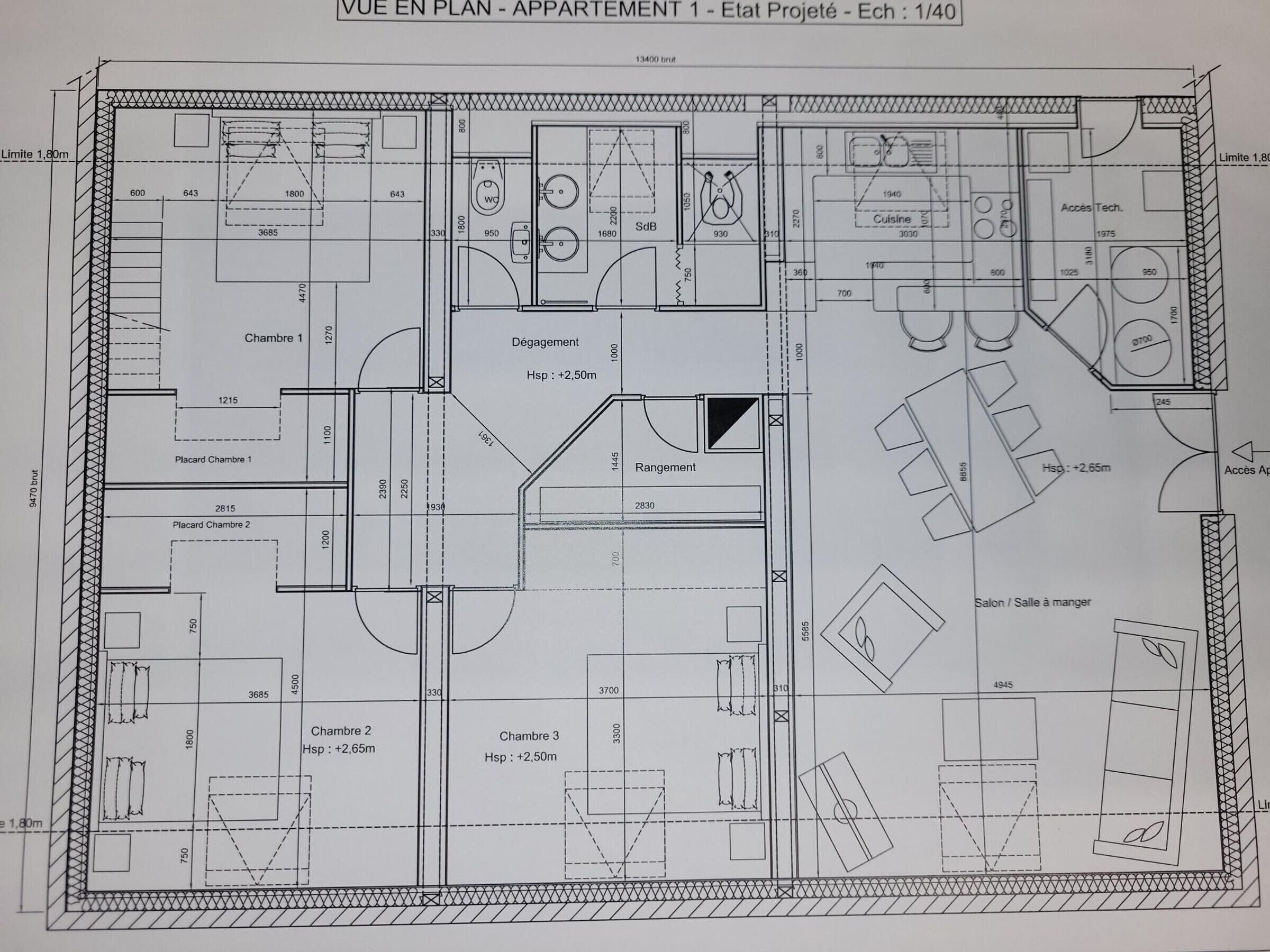 A detailed floor plan of an apartment with three bedrooms, a living area, a kitchen, and a bathroom.