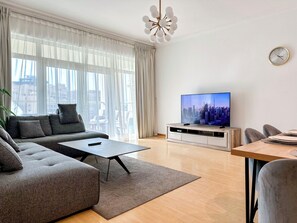 Luxury Apartment, Garden View | Living area - Bright 2BR Apartment with Garden View (Dubai)