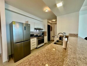 Fridge, microwave, oven, stovetop