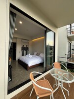 Family Quadruple Room, Balcony, River View | Desk, laptop workspace, blackout drapes, free WiFi