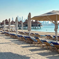On the beach, sun-loungers, beach umbrellas, beach towels