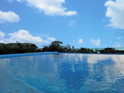 Zen inspired villa with rooftop infinity pool and walk away from the beach