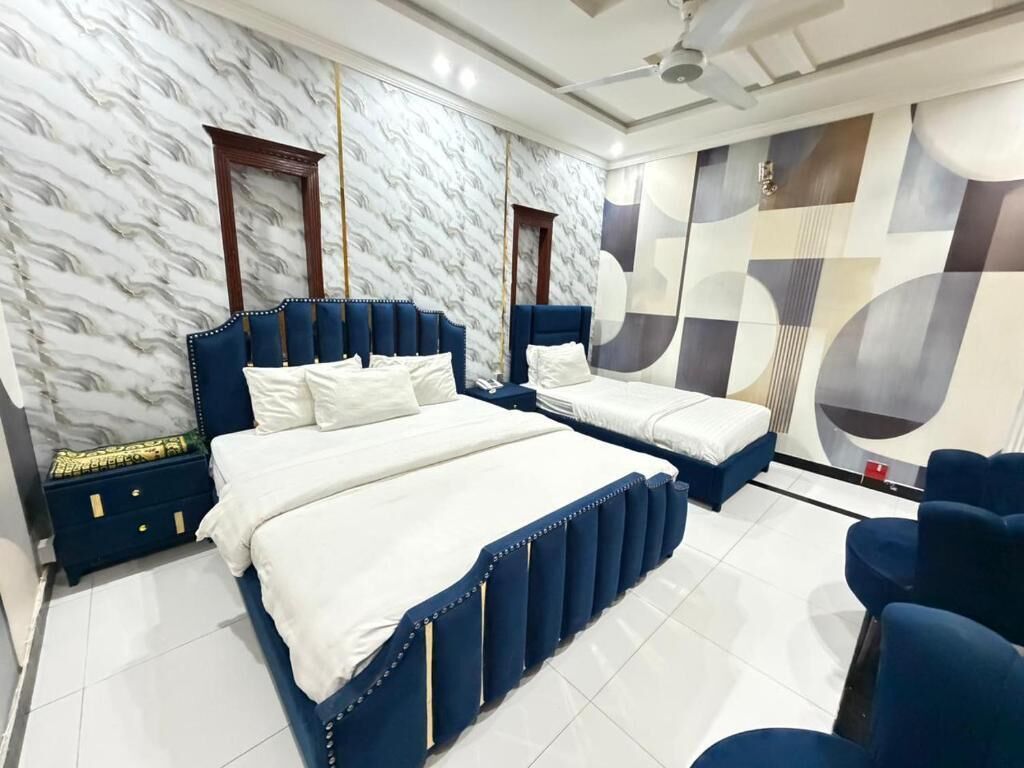 Tremannsrom – deluxe, byutsikt | Lydisolert og wi-fi (inkludert)