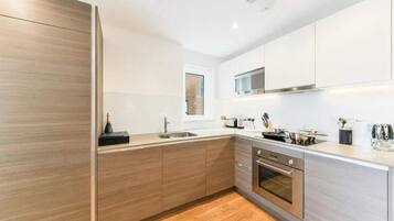 Apartment | Private kitchen | Fridge, microwave, oven, stovetop