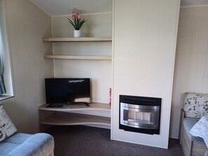 Chalet | Living area | TV, fireplace - Southern Escape uk Hastings (St Leonards-On-Sea)