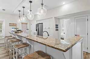 Coffee/tea maker, toaster, dining tables