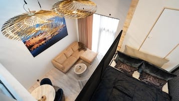 Lyxlägenhet - uteplats | Vardagsrum | Tv