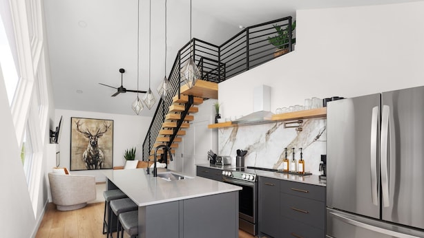 Een moderne keuken met een centraal eiland, roestvrijstalen apparatuur, een marmeren spatwand en een houten trap.