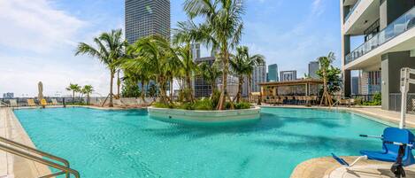 Outdoor pool, free pool cabanas, pool umbrellas