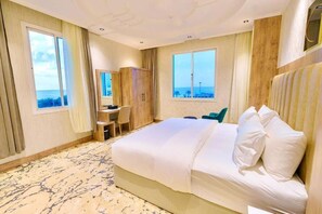 In-room safe, desk, laptop workspace, blackout drapes - Wissam Al Hawraa Hotel (Umluj)