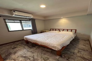 Desk, laptop workspace, free WiFi, bed sheets