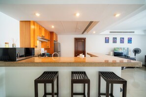 Appartamento Deluxe, balcone, vista giardino | Cucina privata | Tostapane