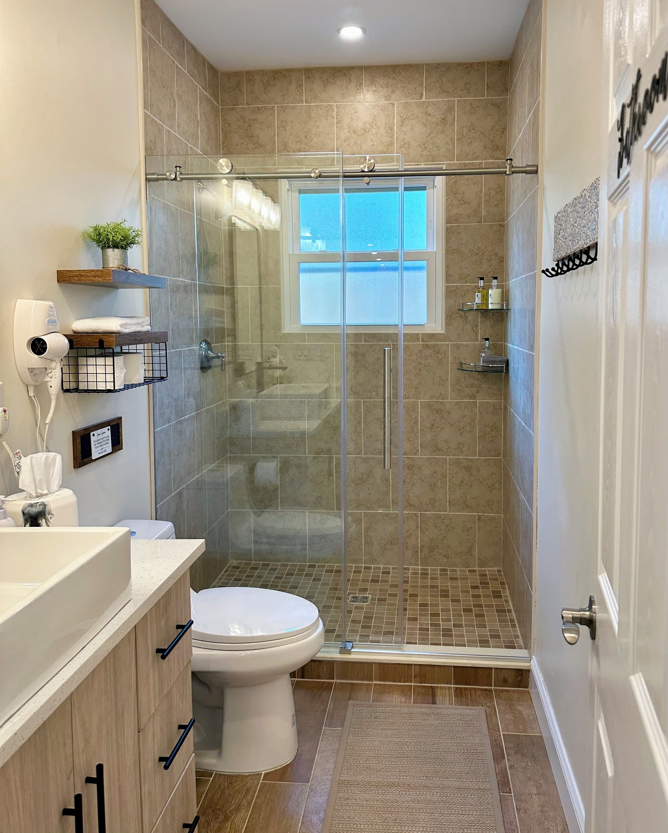 Shower, hair dryer, towels, soap