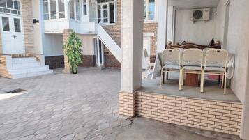 Classic Triple Room, Garden View | Garden