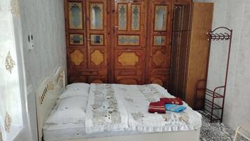 Classic Triple Room, Garden View | Desk, laptop workspace, soundproofing, iron/ironing board