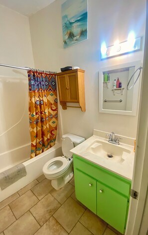 Hair dryer, towels, soap, shampoo